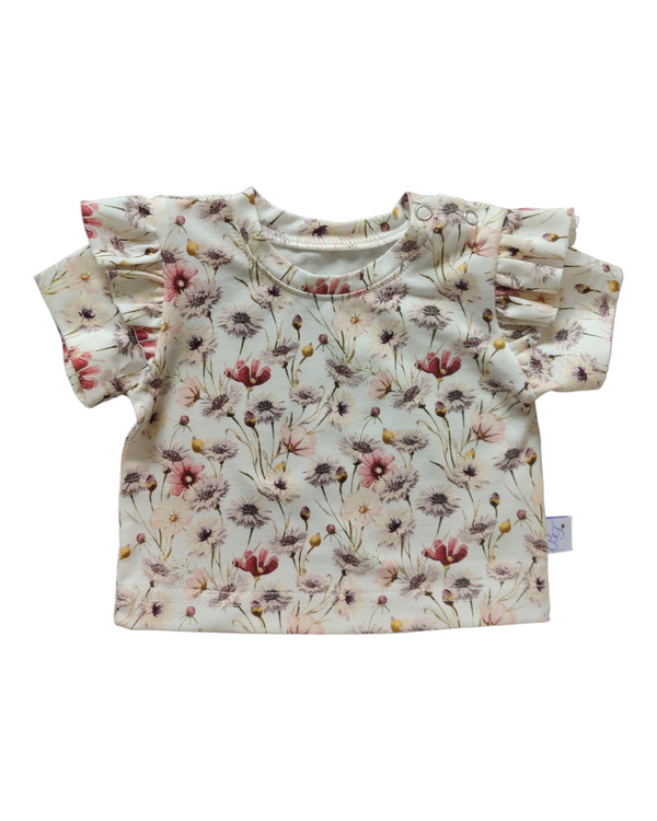 T-shirt ByTasha met ruffles en korenbloemen