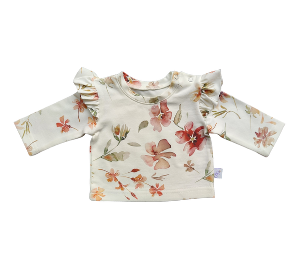 Longsleeve ByTasha met ruffles en roze bloemen